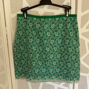 J. Crew mini skirt with white embroidery flowers.